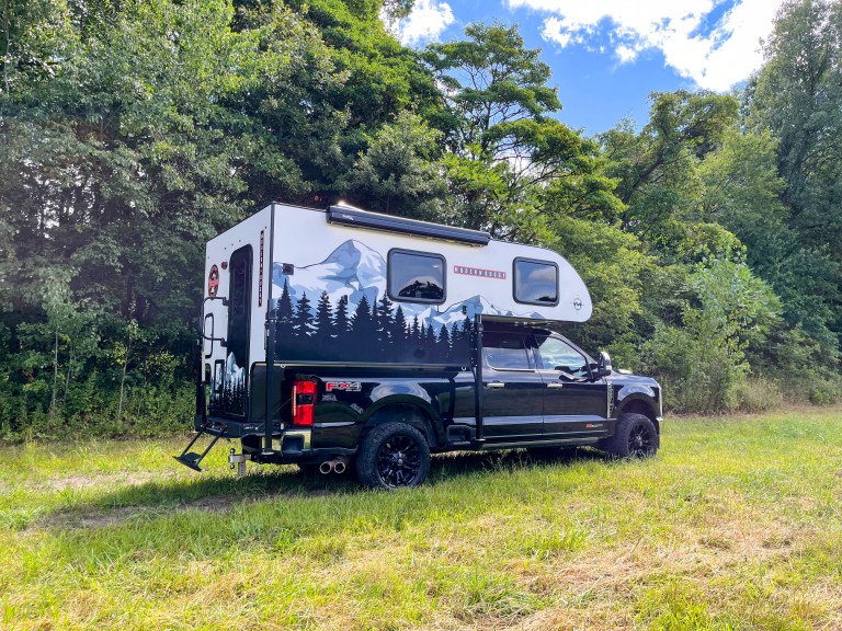 Modern Buggy interior showing compact kitchen and sleeping area
